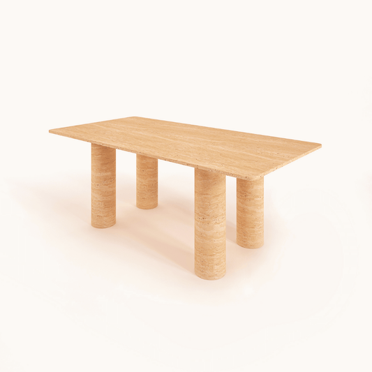 The Columnar Travertine Dining Table by Travertable features a contemporary wooden rectangular top and four cylindrical legs, set against a plain light background, with customizable options to match any decor.