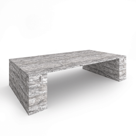 The Travertable Silver Travertine Modern Coffee Table is a sleek, contemporary piece featuring an earthy elegance with its striking stone surface and minimalistic design, boasting sturdy legs and a solid top that highlights its natural beauty.