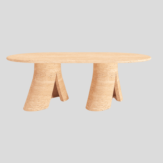 The Terra Elegance Travertine Coffee Table by Travertable is a modern oval table crafted from light-colored travertine, featuring a smooth surface. Its two wide, angled legs provide support and a contemporary look, making it a luxurious centerpiece for modern living spaces against a gray backdrop.