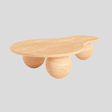 Discover the Tranquil Stone Travertine Coffee Table by Travertable, featuring a sleek, modern design with organic stone textures and three spherical legs on a light gray background. This table is both visually stunning and a durable addition to any décor.