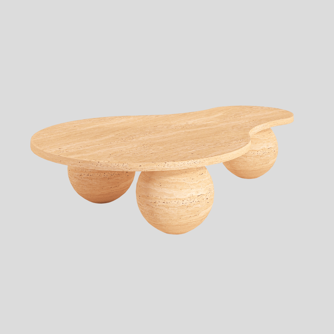 Discover the Tranquil Stone Travertine Coffee Table by Travertable, featuring a sleek, modern design with organic stone textures and three spherical legs on a light gray background. This table is both visually stunning and a durable addition to any décor.