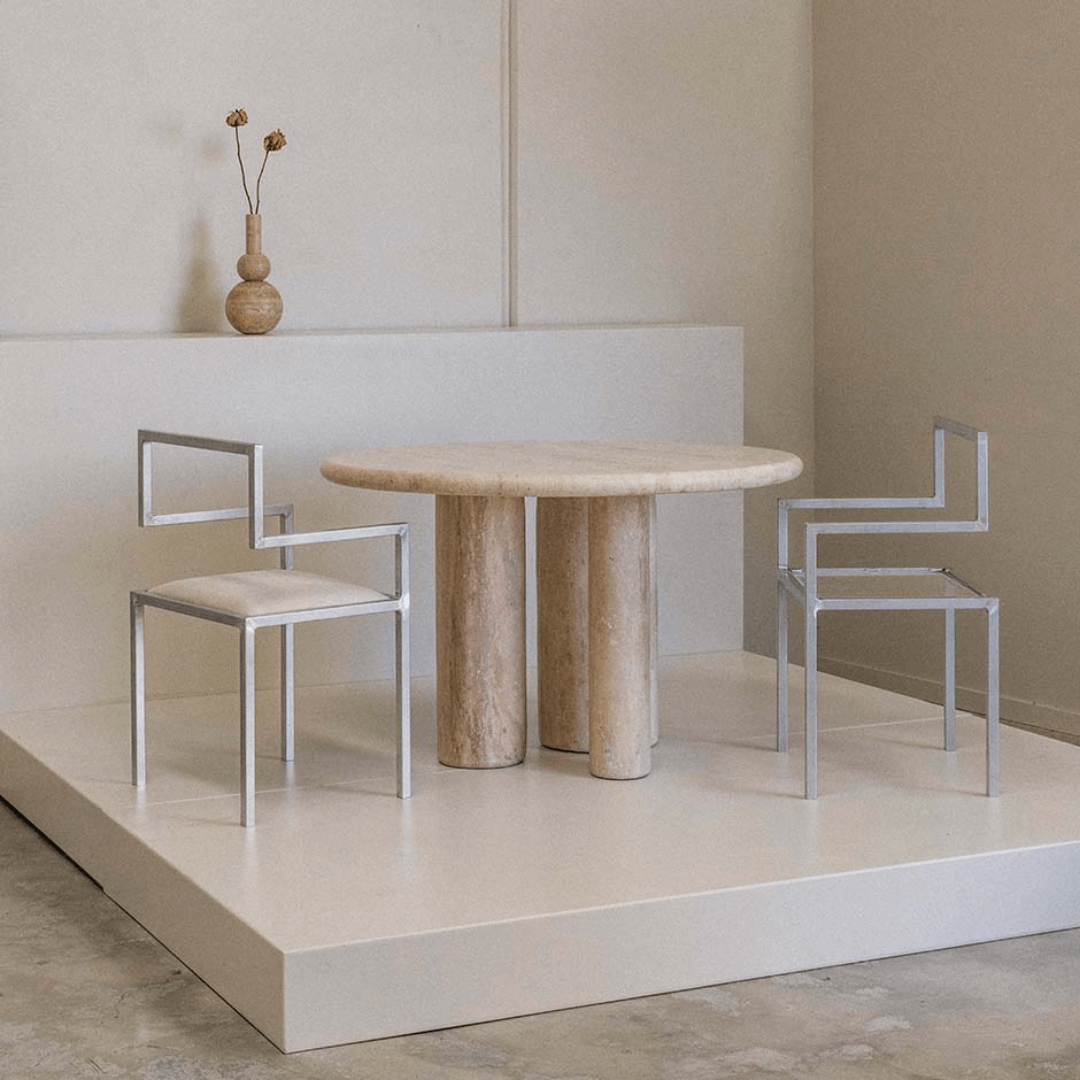 The Trio Round Travertine Dining Table