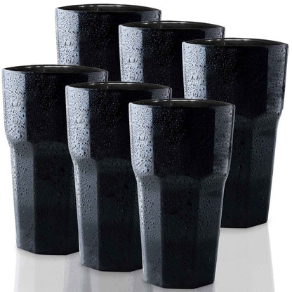 Six Mamaco Home Unbreakable Drinking Glasses, 11 oz each in black, are arranged in two rows. Made from durable polycarbonate, they feature a glossy finish and faceted design. Water droplets enhance their modern look, adding a fresh feel to this reusable set perfect for juice, cocktails, and parties.
