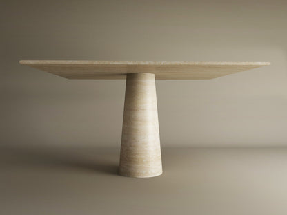 The TRAVERTABLE Square Travertine Dining Table features a light-hued stone top and a natural travertine conical pedestal base, customizable to order, shown against a plain beige background.