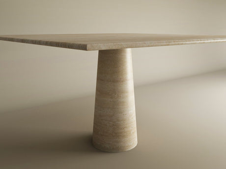 The TRAVERTABLE Square Travertine Dining Table features a natural travertine top and a conical pedestal base, customizable to your style, and is shown against a neutral background.