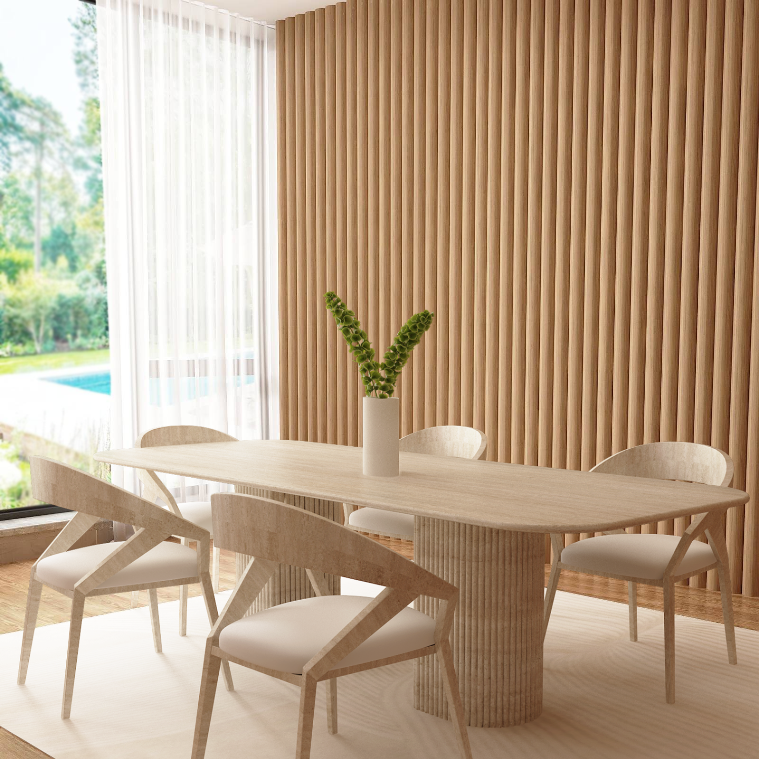A modern dining room showcases the TRAVERTABLE Rectangular Travertine Dining Table with Fluted Round Base, four matching chairs, a white vase with green leaves, beige vertical wall panels, a large window, and views of the garden and pool.