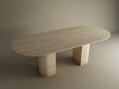 The TRAVERTABLE Oval Travertine Dining Table features a natural stone tabletop and twin sloped pedestal bases, standing on a light brown surface with a neutral background. Customizable to suit your space.