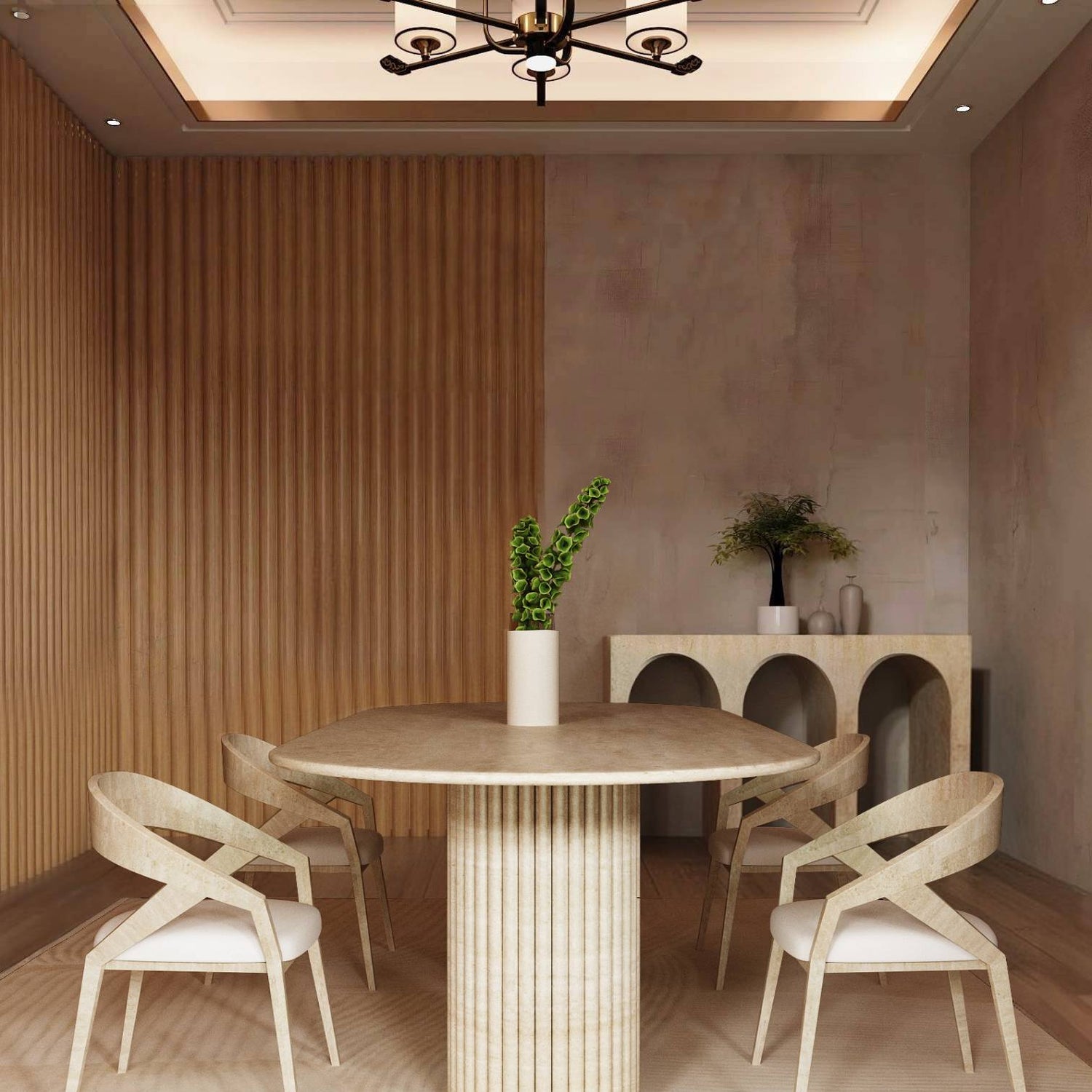 A modern dining room features the TRAVERTABLE Oval Travertine Dining Table with Vertical Groove Base, four light wood chairs with white cushions, a white vase with green leaves, a sideboard, wooden flooring, and vertical wood wall paneling.