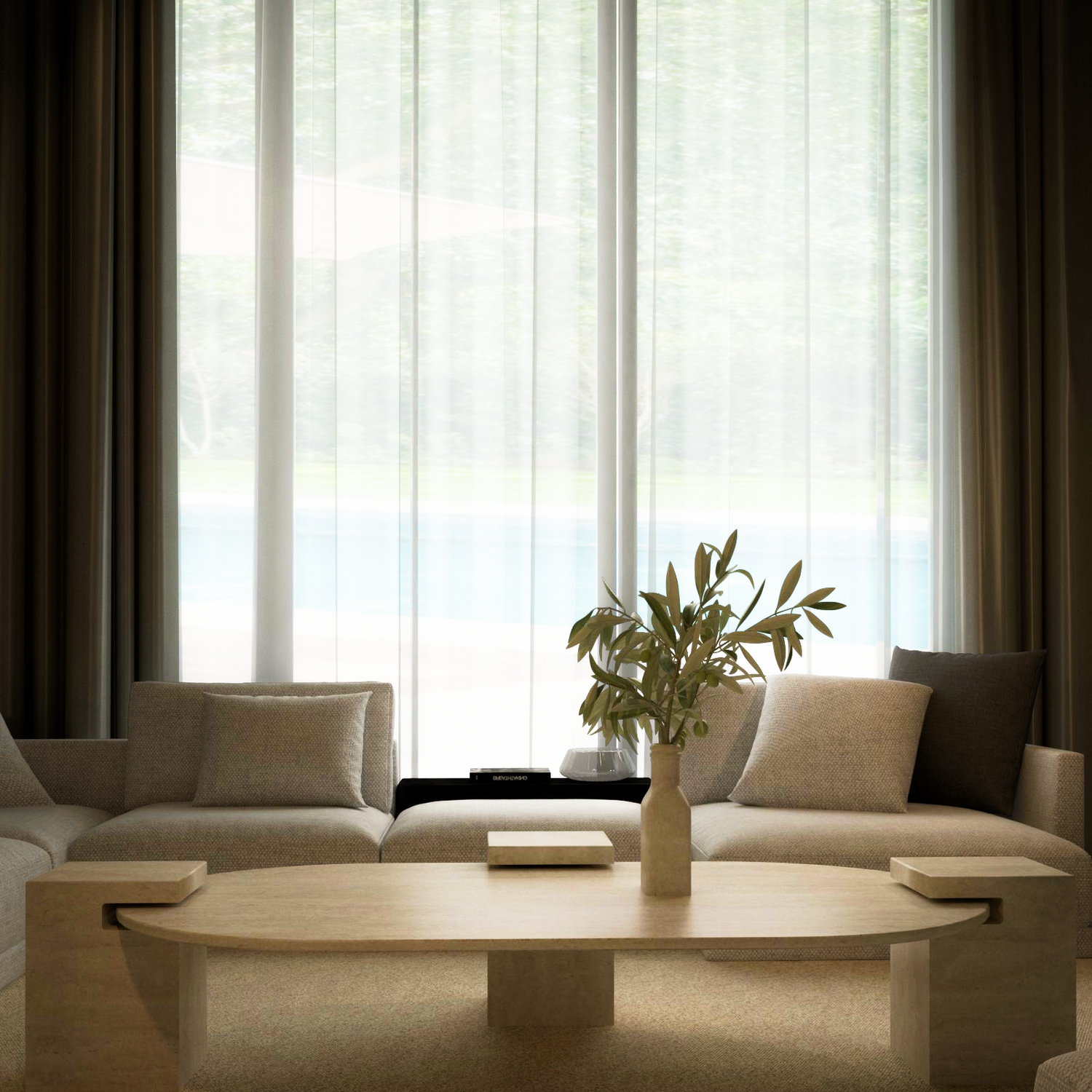 A modern living room features TRAVERTABLE’s Oval Travertine Coffee Table with Square Base – Understated Elegance, surrounded by neutral sofas and greenery. A vase with foliage sits atop the customizable table, enhancing the calm, minimalist ambiance.