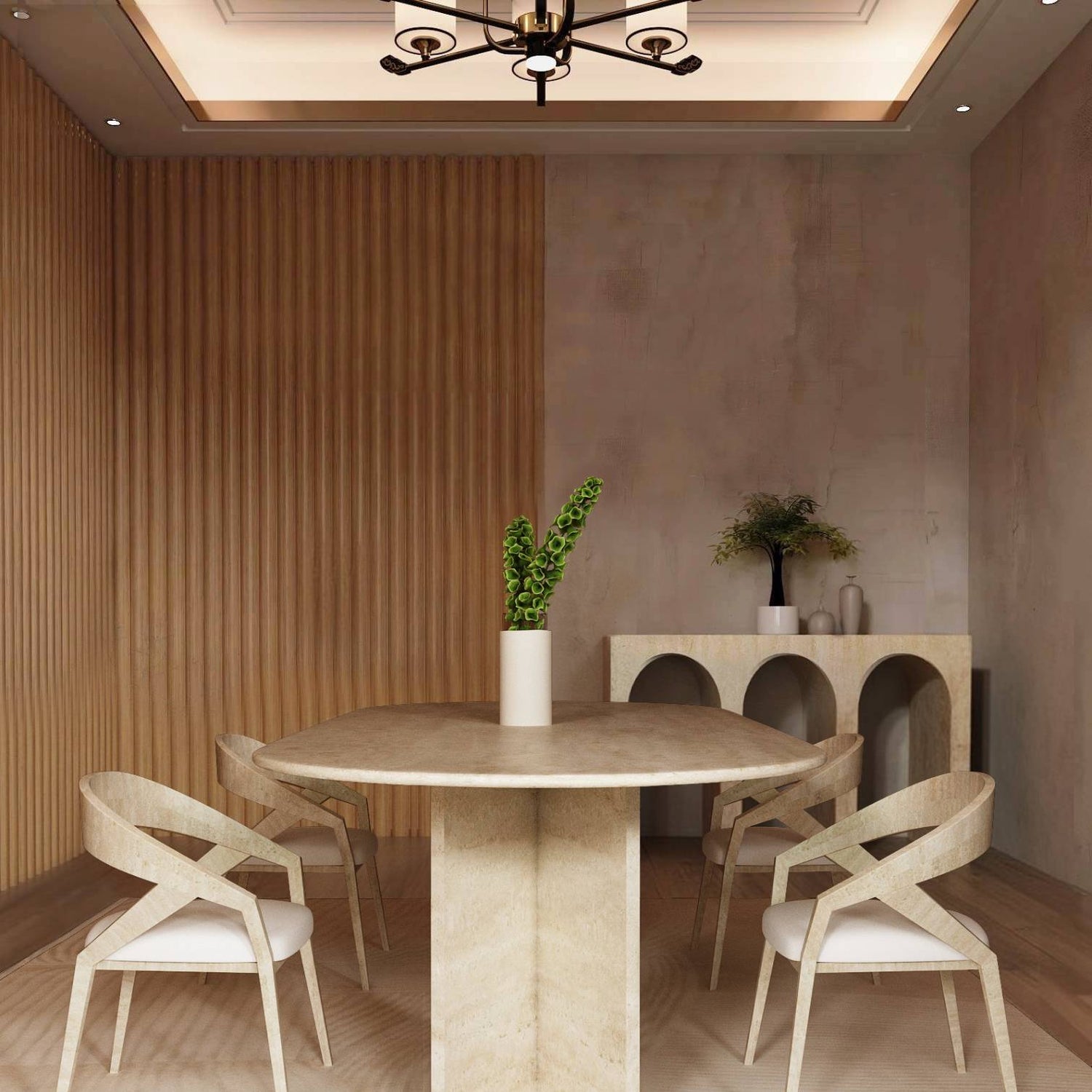 A modern dining room showcases the TRAVERTABLE Oval Travertine Dining Table with Split-V Pedestal Base, paired with four light wood chairs, a central vase of green leaves, and a console table displaying plants and decor by wooden paneling.