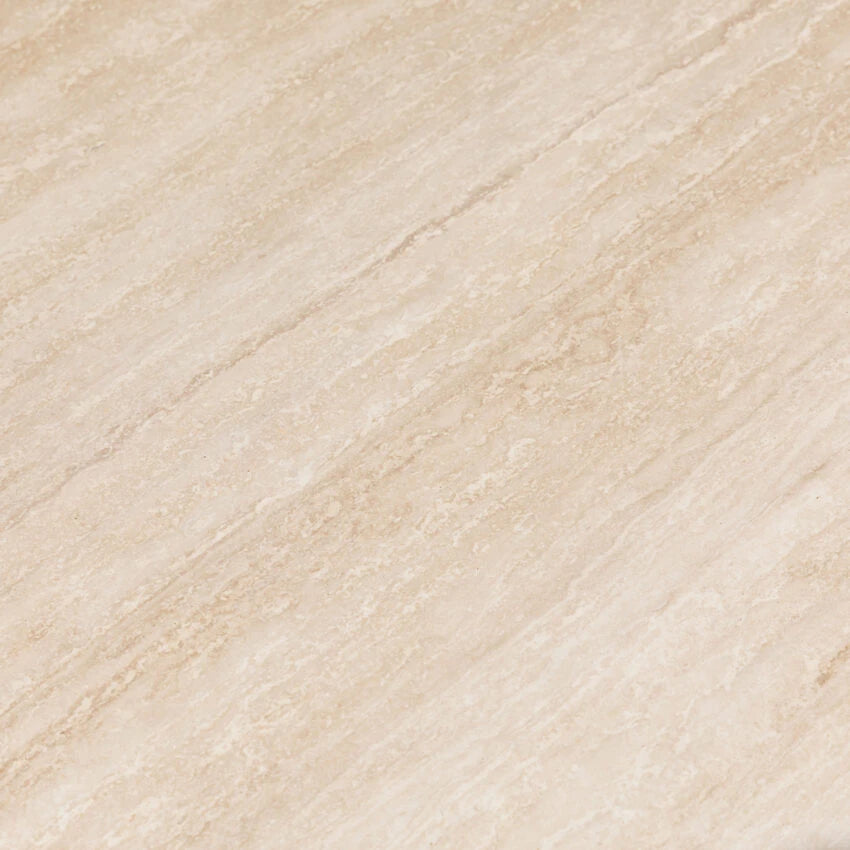 Close-up of vein-cut travertine showcasing its natural texture, soft beige tones, and linear veining patterns.