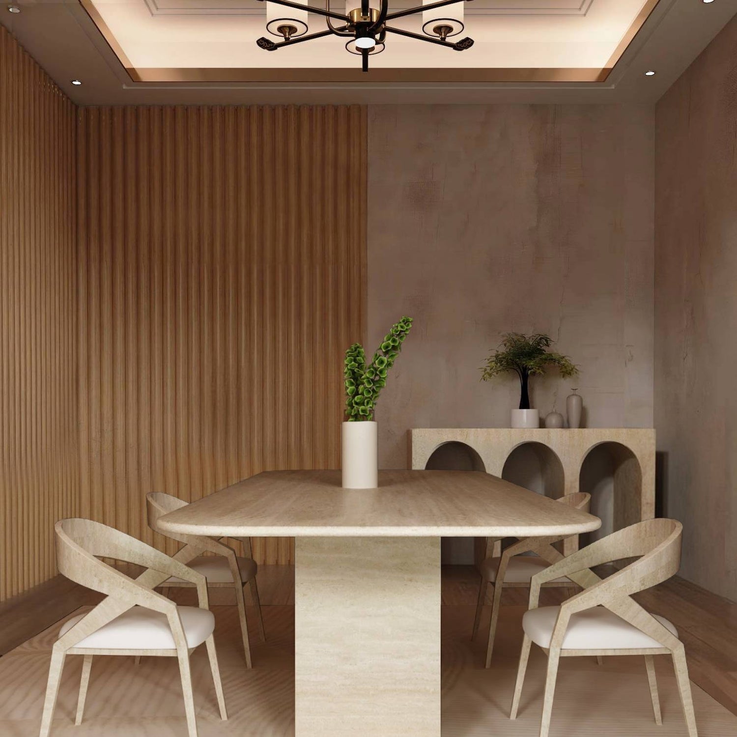 A modern dining room features the TRAVERTABLE Rectangular Travertine Dining Table with a travertine stone base, four light wood chairs with white cushions, a vase of green leaves, and a sideboard with vases against textured beige walls.