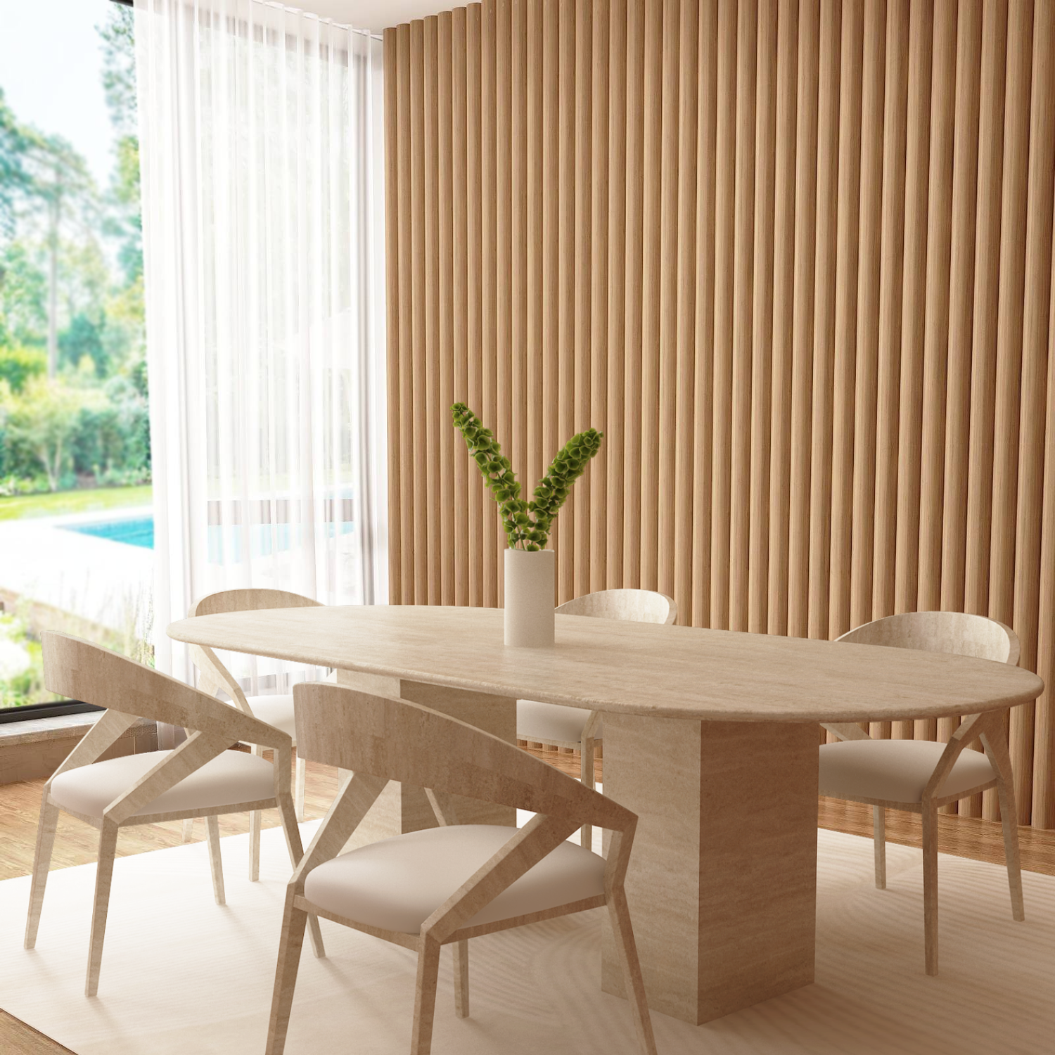 A dining room featuring the TRAVERTABLE Oval Travertine Dining Table with Rectangular Pedestal Base, six modern wooden chairs with white cushions, a white rug, a tall vase with green leaves, floor-to-ceiling windows, and wooden wall panels.