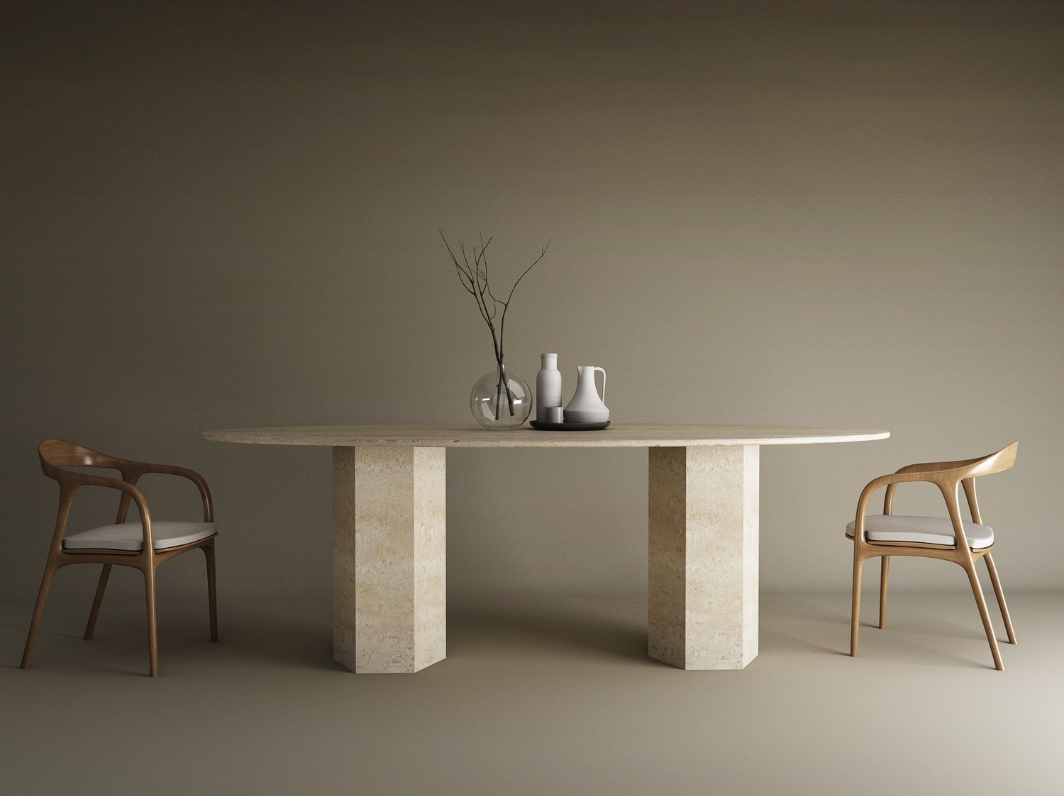 A minimalist scene featuring the TRAVERTABLE Ellips Travertine Dining Table with Hexagonal Pedestal Base, two wooden chairs with white cushions, and simple vases with bare branches, set against a neutral beige background.