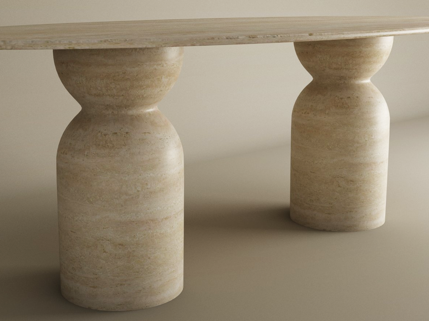 The TRAVERTABLE Ellips Travertine Dining Table features a customizable organic travertine stone top and sculptural round base, making it a timeless centerpiece designed to elevate any dining space.