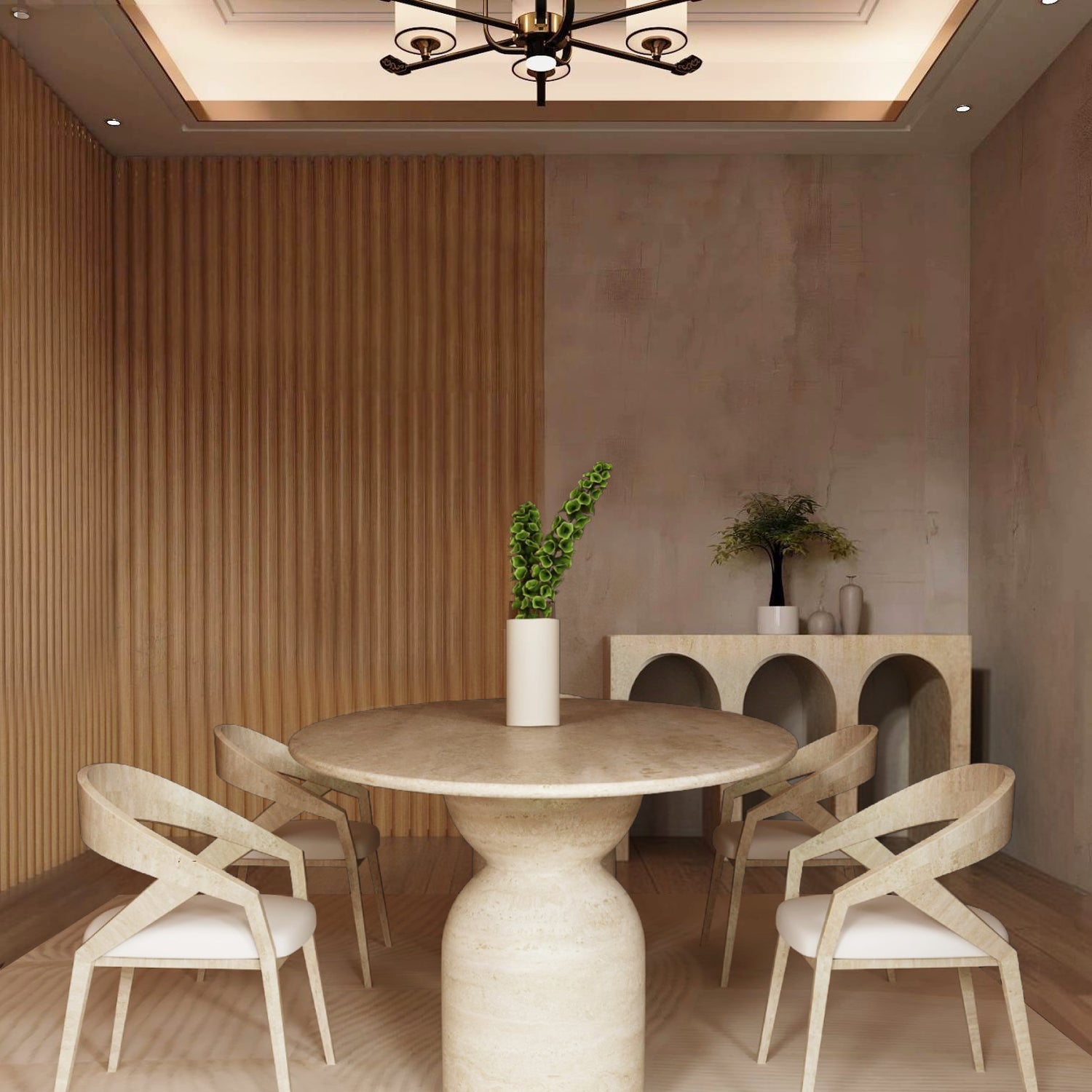 A modern dining room featuring the TRAVERTABLE Ellips Travertine Dining Table with a sculptural round organic stone base, four light wood chairs with white cushions, green stems in a vase, a decor-adorned sideboard, and vertical wooden wall panels.