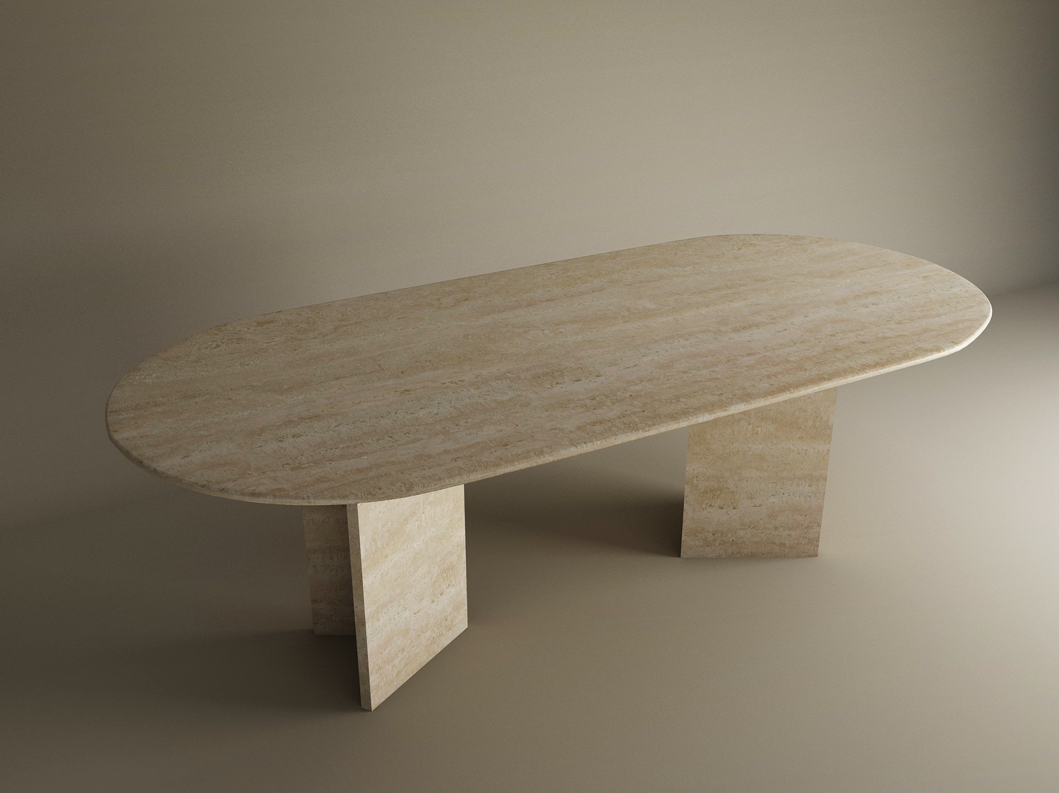 The TRAVERTABLE Oval Travertine Dining Table features a smooth, natural stone top and a split-V pedestal base, standing elegantly in a minimally lit, neutral-toned room. Customizable design with premium travertine stone.