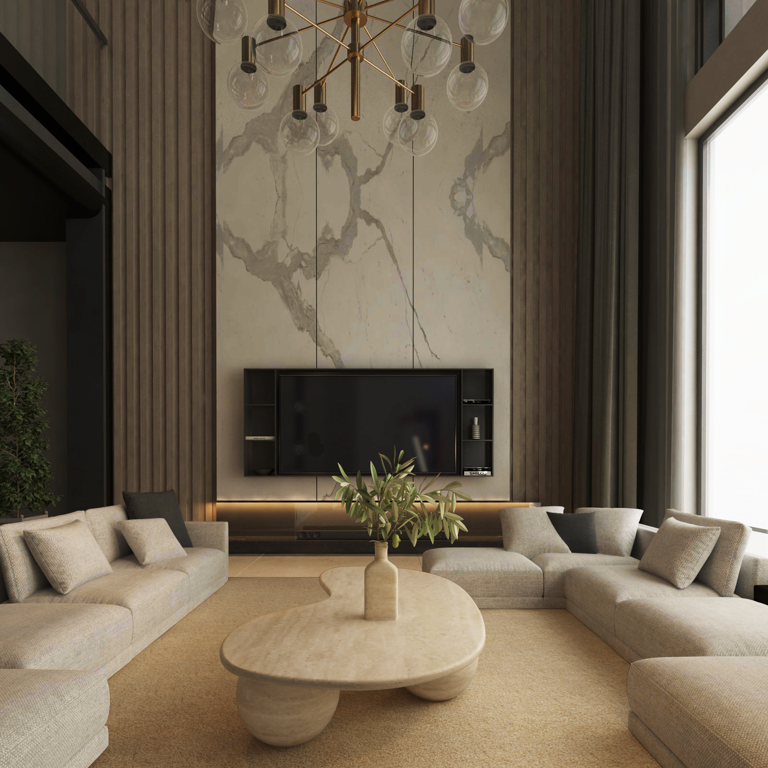 A modern living room features beige sofas in a U-shape around the TRAVERTABLE Wavy Travertine Coffee Table with Stone Ball Base and Organic Sculpture (Customizable). A large TV sits on a marble wall flanked by shelves, with tall windows filling the space with light.