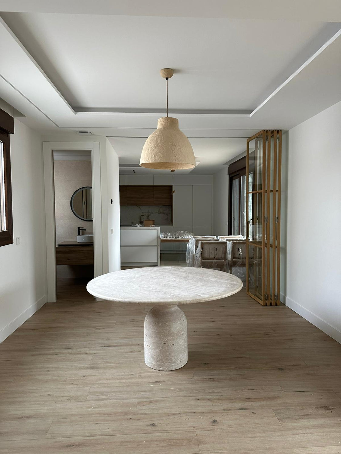 Round Travertine Dining Table with Sculptural Round Center Base