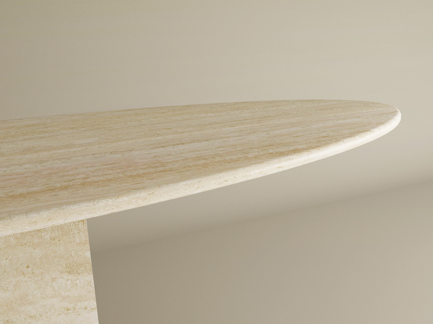 Close-up of the TRAVERTABLE Ellips Travertine Console Table with Block Base, showcasing its light natural stone finish, oval shape, vertical block base, and subtle textures against a plain beige background. Customizable design available.