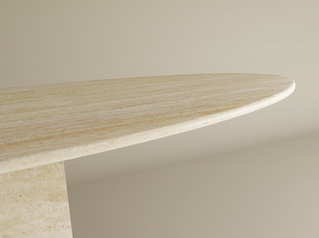 Close-up of the TRAVERTABLE Ellips Travertine Console Table with Block Base, showcasing its light natural stone finish, oval shape, vertical block base, and subtle textures against a plain beige background. Customizable design available.