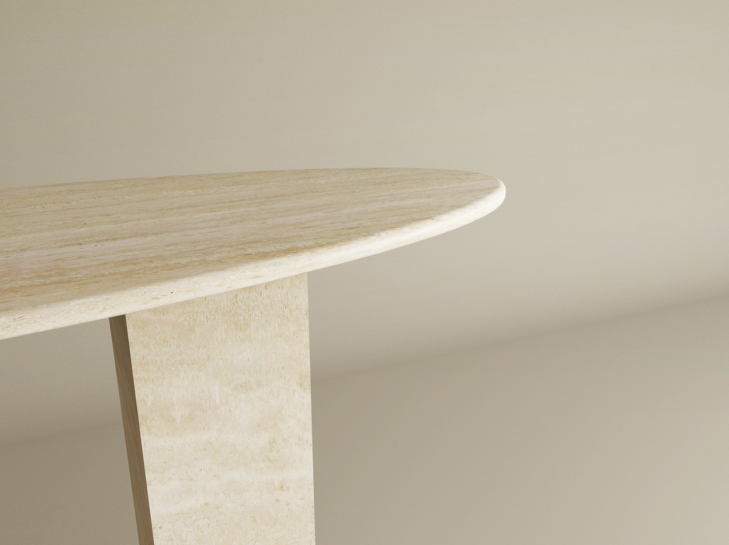 A close-up of the TRAVERTABLE Ellips Travertine Console Table with a rectangular pedestal base highlights its sculptural oval design in travertine stone, set against a plain, light-colored background.