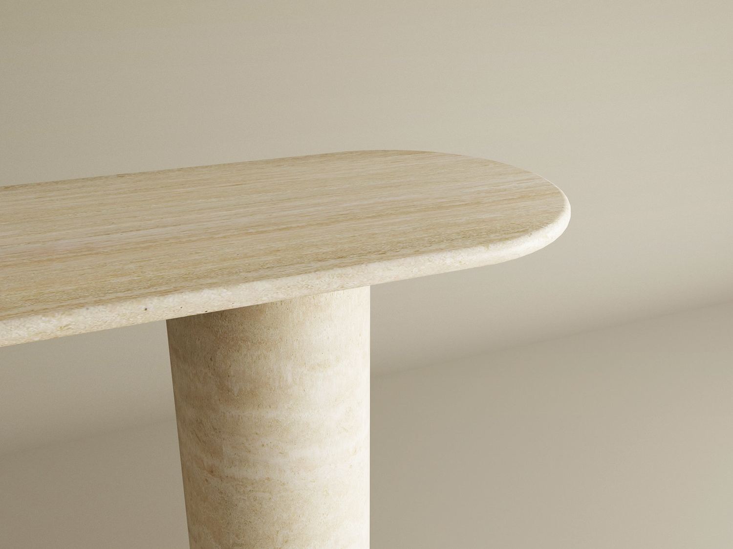 A close-up of the TRAVERTABLE Ovale Travertine Console Table, featuring a smooth cylinder pure travertine stone base and rounded edge, set against a neutral background; this customizable piece exudes elegance.