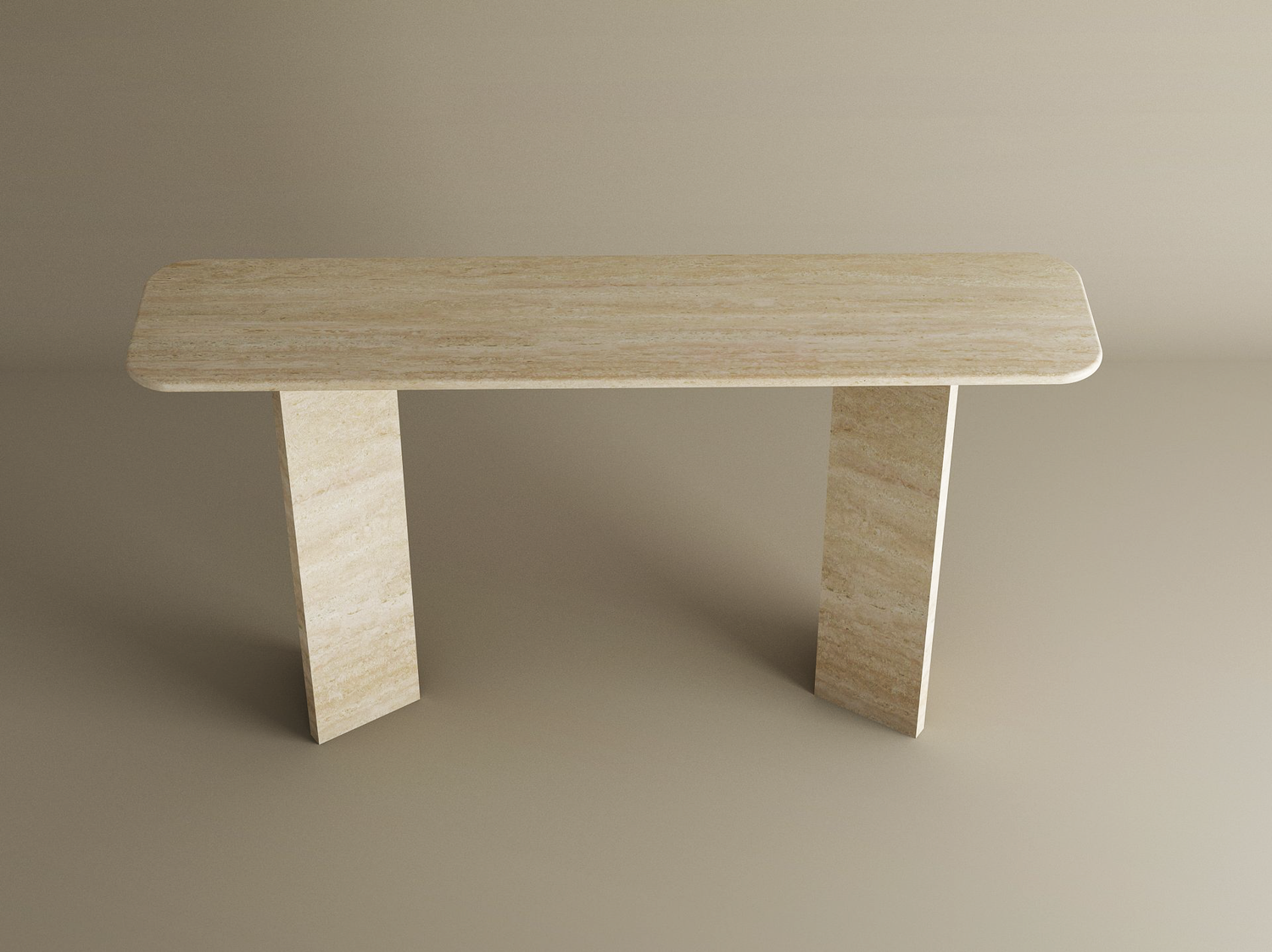 The TRAVERTABLE Rectangular Travertine Console Table features a split-V pedestal stone base and rounded edges, offering a modern minimalist silhouette in light beige travertine. Customizable to fit your space.