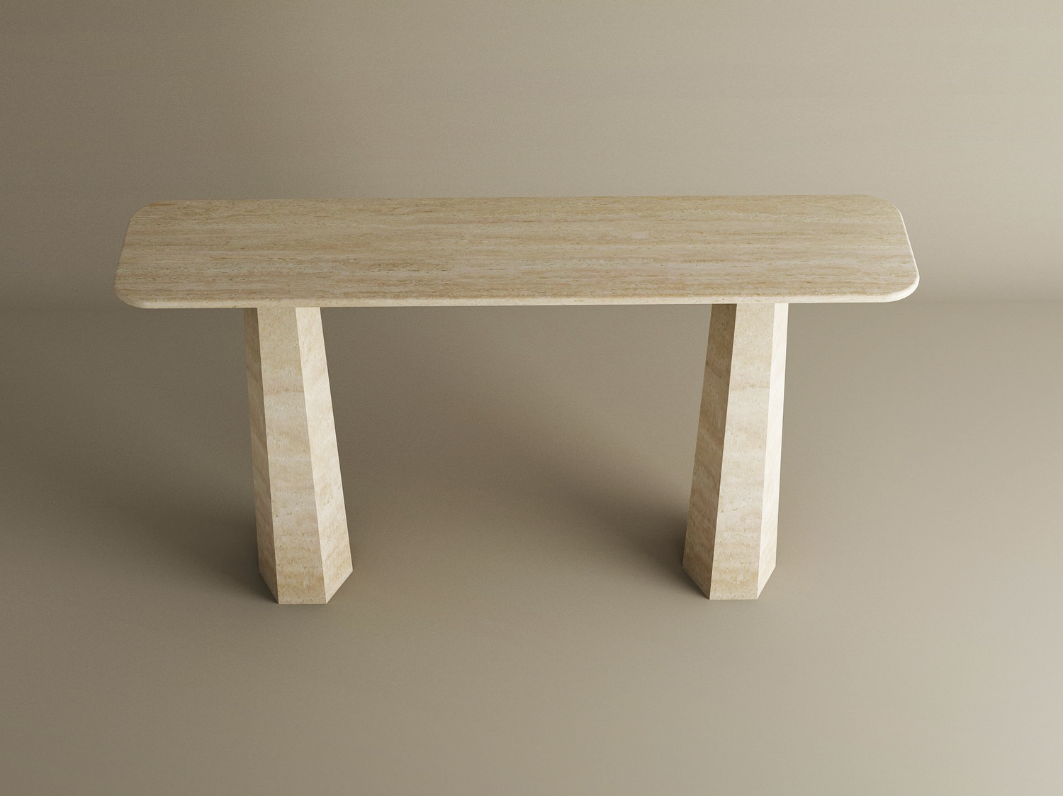 The TRAVERTABLE Rectangular Travertine Console Table features a sleek, light beige solid travertine build, rounded polished top, and two thick tapered round bases near the edges. Contemporary design fits beautifully into any neutral space. Customizable options available.