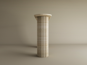 The Ovale Travertine Console Table by TRAVERTABLE, featuring a vertical groove organic stone base, stands alone against a light background under soft lighting. No other objects or decorations are present.