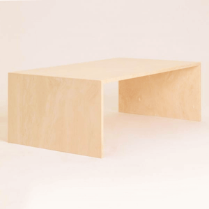 Customizable travertine coffee table displayed in a modern living room setting