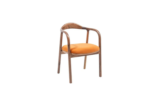 Travertables Contemporary Curve Armchair features a sleek modern design with a curved wooden frame and armrests. Its vibrant orange cushions stand out against a minimalist white backdrop, offering an eye-catching yet sophisticated aesthetic.