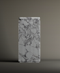 The TRAVERTABLE Calacatta Square Marble Pedestal Vanity Sink features a marble-like surface with dark veins and vertical black grooves, set against a neutral background—ideal for modern bathroom design.