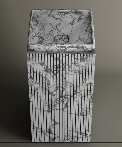 The TRAVERTABLE Calacatta Square Marble Pedestal Vanity Sink features a freestanding design with a Calacatta marble pattern, vertical pedestal grooves, and a smooth, sloped basin—ideal for modern bathrooms against neutral backgrounds.