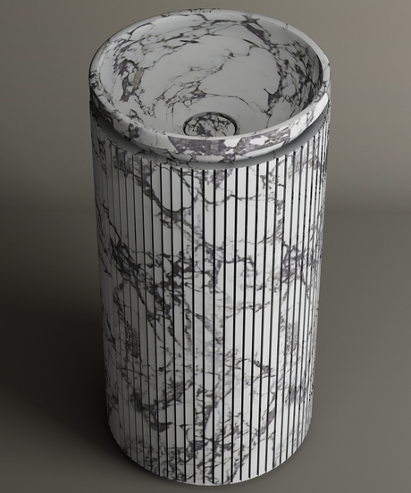The TRAVERTABLE Calacatta Round Marble Pedestal Vanity Sink features vertical grooves and elegant gray veining on a light background, showcasing Italian artistry in premium Calacatta marble.