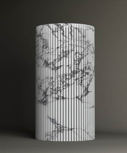 The TRAVERTABLE Calacatta Round Fluted Marble Pedestal Vanity Sink features a white surface with vertical black lines and gray marble-like veining, bringing a modern touch to any space against a dark background.